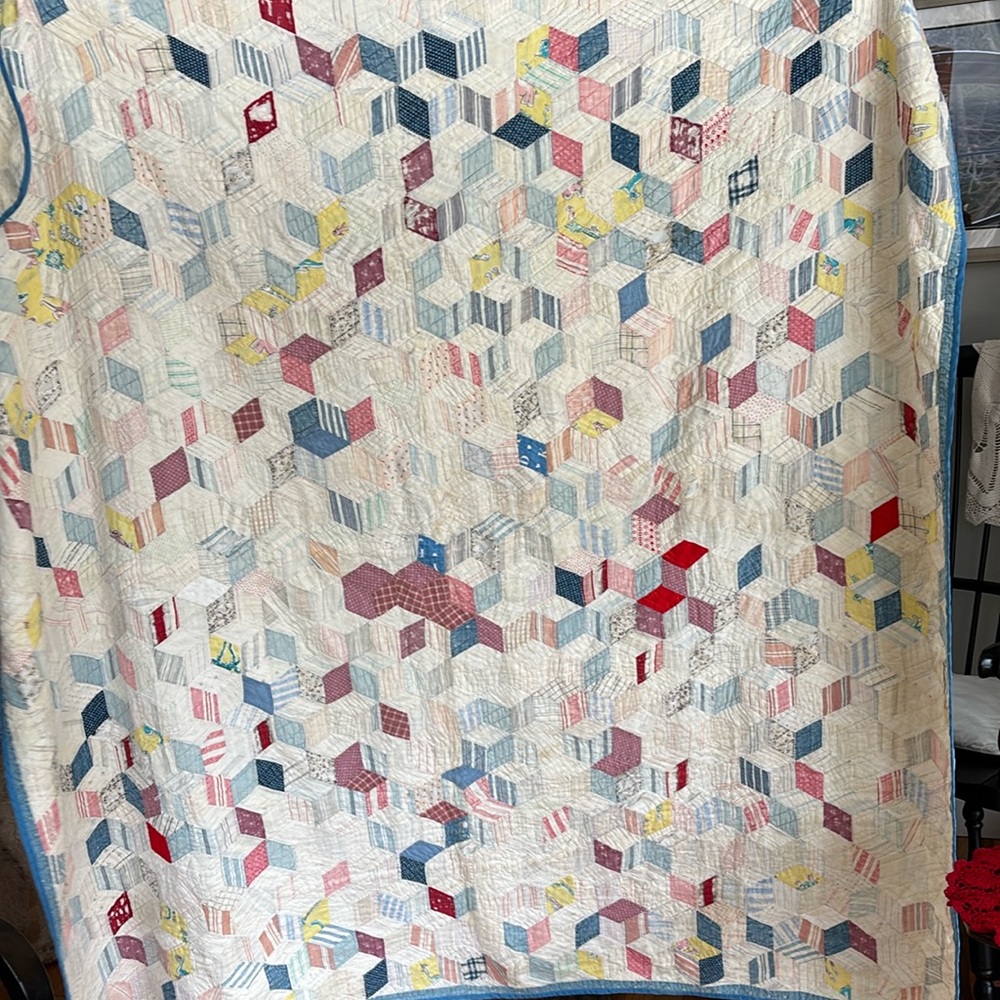 Antique quilt with hand quilting